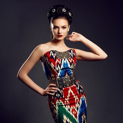 Woman in colorful ikat dress