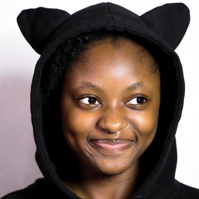 African-American woman in cat ear hoodie
