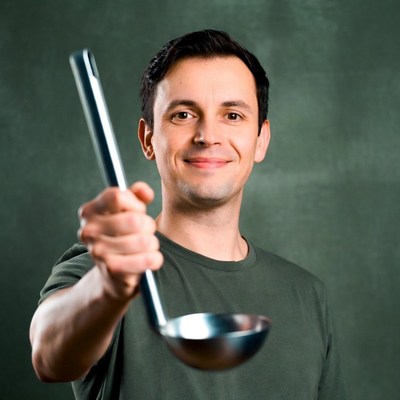 Man holding ladle