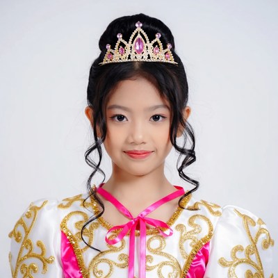 Asian girl wearing princess crown