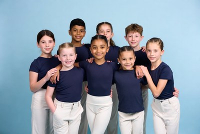 Group of children in navy dance uniforms