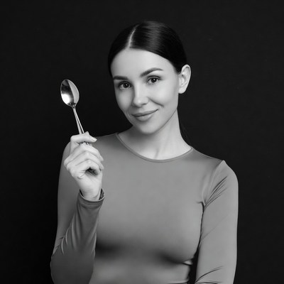 Woman holding spoon