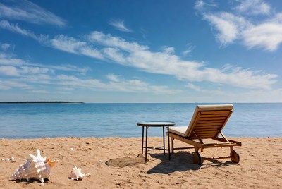 Beach Chair with Shells by Ocean