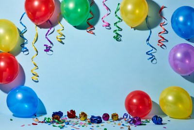 Colorful Balloons and Confetti on Blue Background