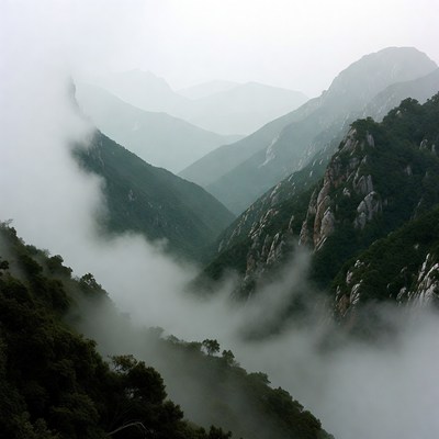 Misty Mountains with Green Valleys