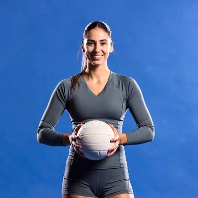 Woman holding volleyball