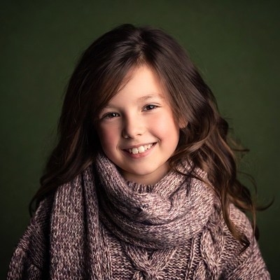 Smiling girl with scarf