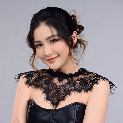 Asian woman in black lace corset