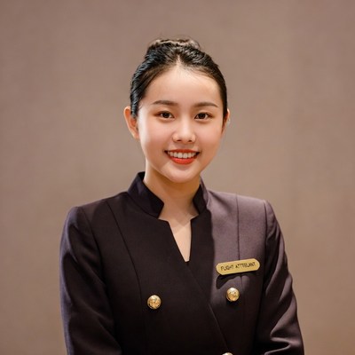 Asian woman in flight attendant uniform