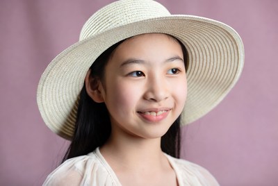 Asian girl wearing straw hat