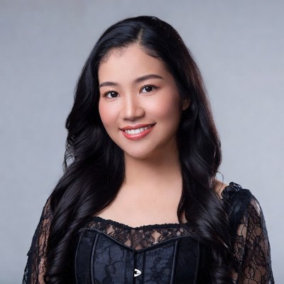 Asian woman in black lace top