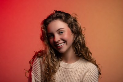 Smiling woman with curly hair