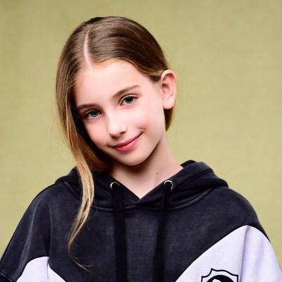 Smiling girl in black hoodie