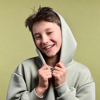 Smiling boy in hoodie