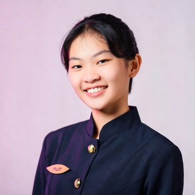 Asian female pilot smiling