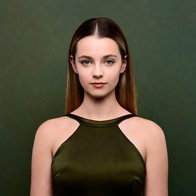 Young woman in green dress