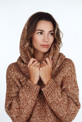 Woman in brown hooded sweater