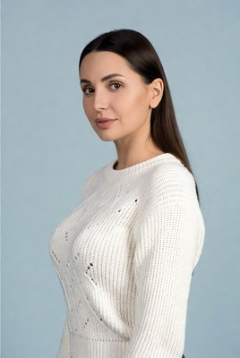 Woman in white knit sweater