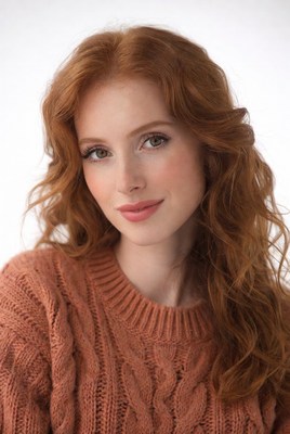 Redhead woman in orange sweater