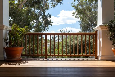 Wooden Balcony Overlooking Lush Trees