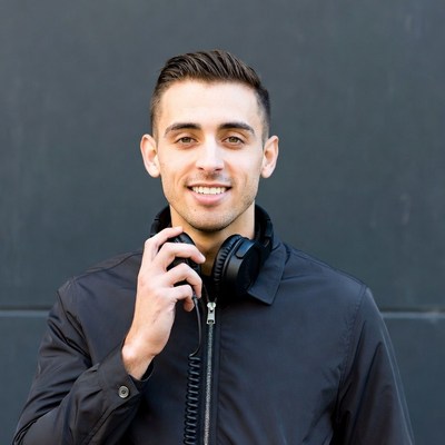 Man holding headphones