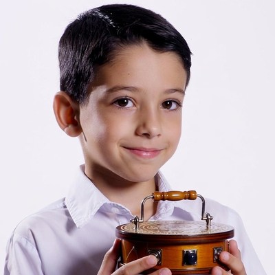 Boy holding wooden music box