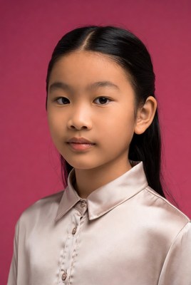 Asian girl in satin shirt