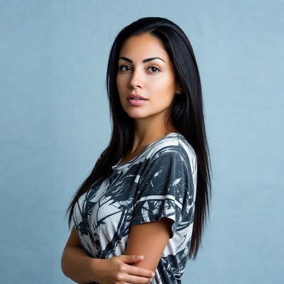 Latina woman with arms crossed
