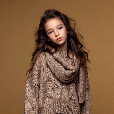 Girl in beige knit sweater