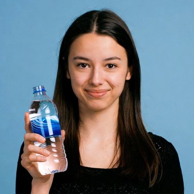 Young woman holding water bottle