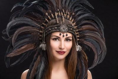 Woman wearing Native American headdress