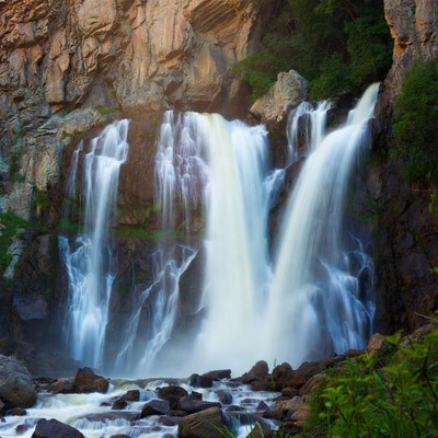Majestic Triple Waterfall in Canyon