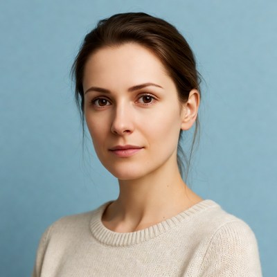 Woman with brown hair on blue background