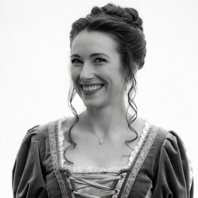 Woman smiling in Renaissance gown