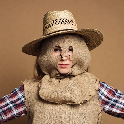 Girl in scarecrow costume