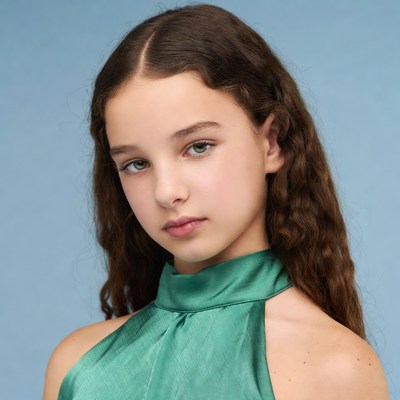 Teen girl in green dress portrait