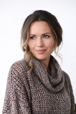 Woman in chunky knit turtleneck sweater