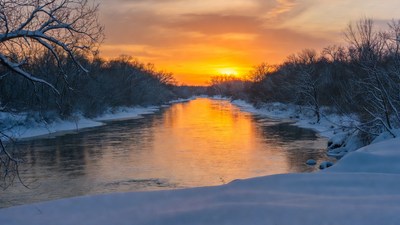 Winter River Sunset with Snowy Banks