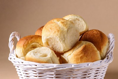 Fresh Dinner Rolls in Wicker Basket