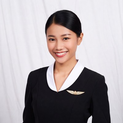 Asian flight attendant smiling
