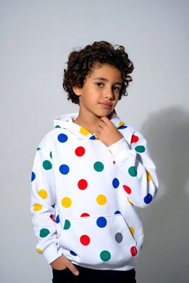 Boy in colorful polka dot hoodie