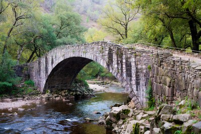 Stone Arch Bridge over River