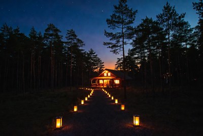 Cozy Cabin with Lantern Path in Forest Night