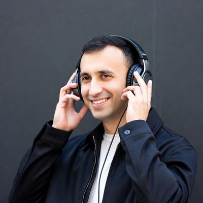 Man wearing headphones smiling