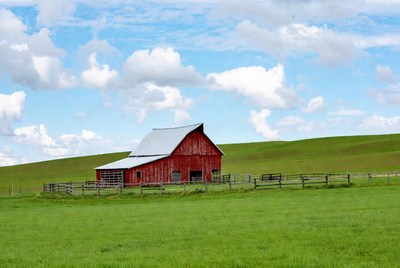 Red Barn in Green Rolling Hills