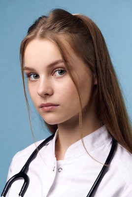 Young woman doctor with stethoscope