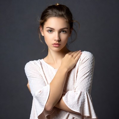 Young woman with arms crossed