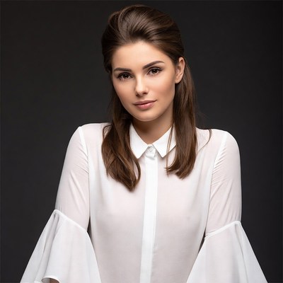 Woman in white bell sleeve blouse