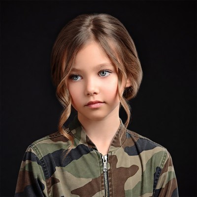 Girl in camouflage jacket