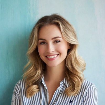 Smiling blonde woman in striped shirt